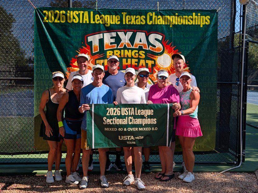 A Houston Mixed 40 & Over 8.0 team with their sectional championship banner